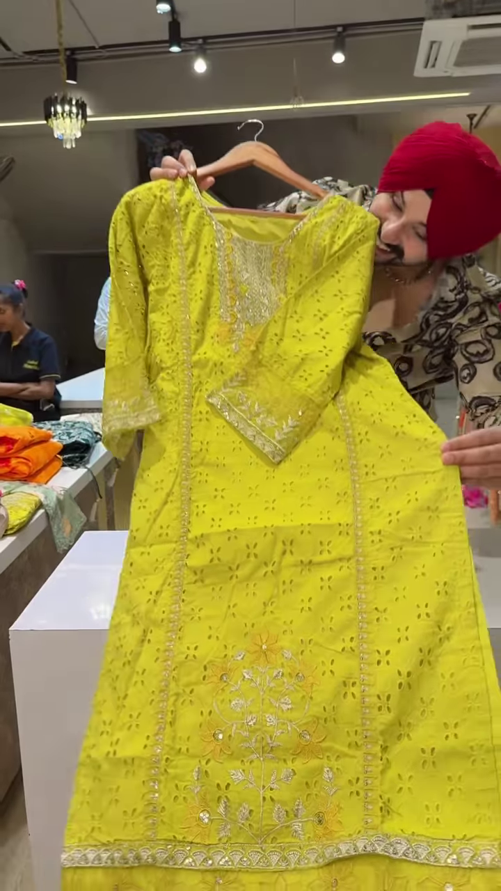 Cream Floral Embroidered Long Dress with Purple Lace Cuffs and Brown Bottoms - Image 4