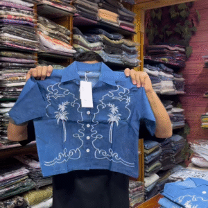 Light Blue Long-Sleeve Shirt with White Floral Embroidery and Button-Front Closure