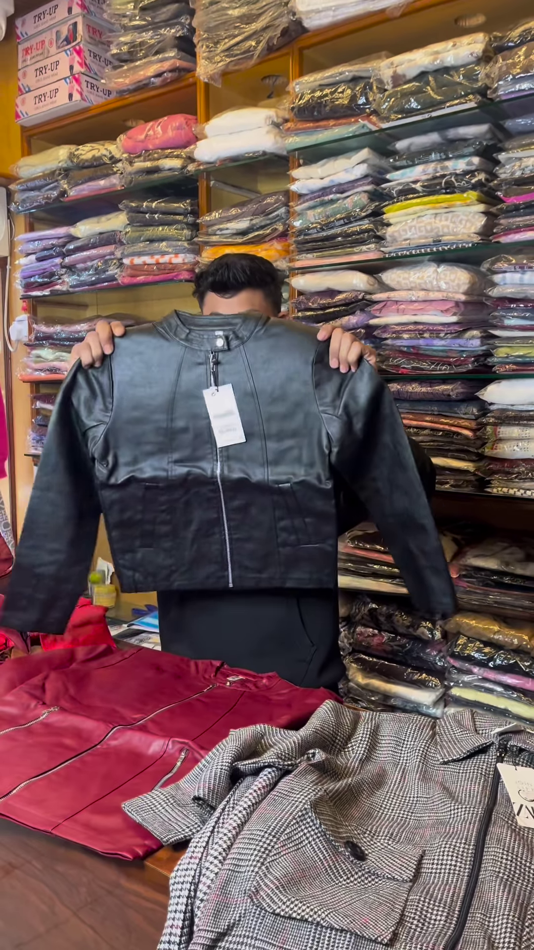 Black and White Checkered Long-Sleeve Jacket with Front Flap Pockets and Button Closure - Image 3